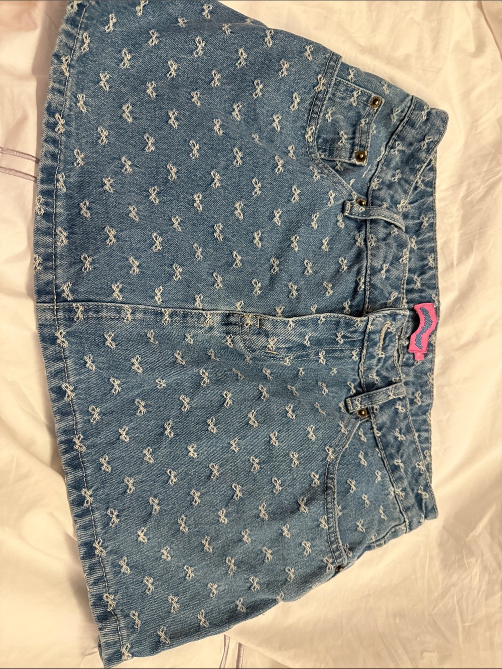 Edikted Light Blue Denim Mini Skirt with White Embroidered Bows